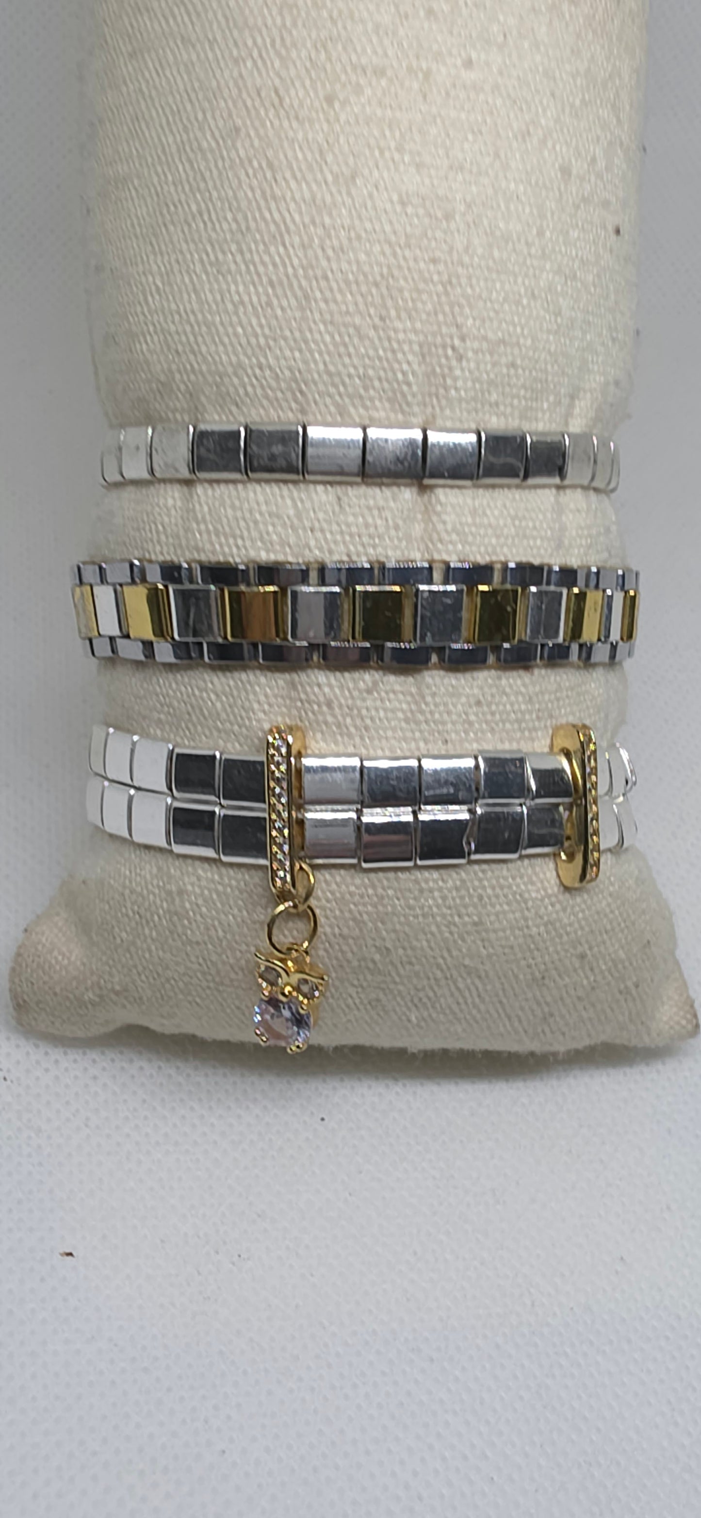 Elegant silver hematite bracelet  stack with cubic zirconia charm from the Metal Motion Collection.