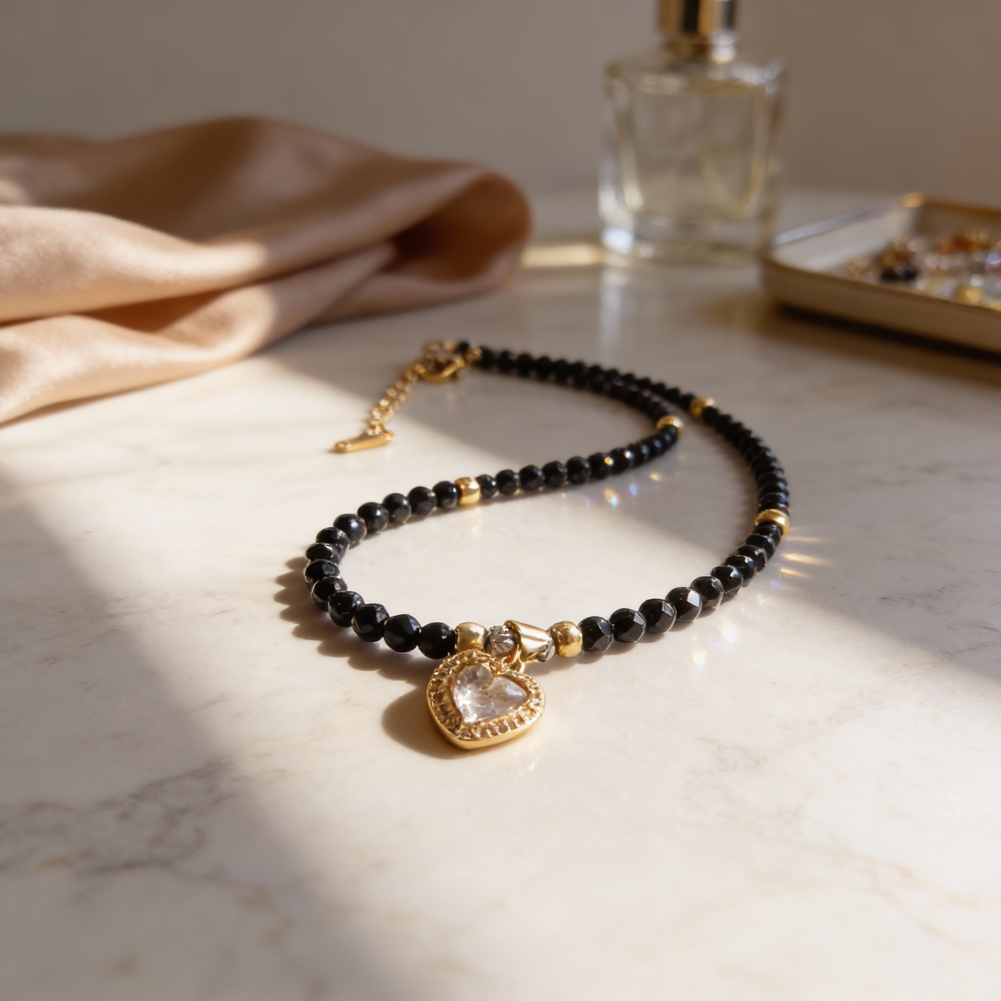 onyx-heart-glow-necklace-black-onyx-gold-plated-gem-glow-natali.jpg