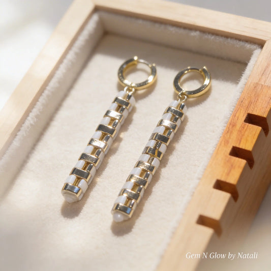 Handmade Linear Drop Miyuki Tila bead earrings from the Ivory Rhythm Collection displayed in jewelry box