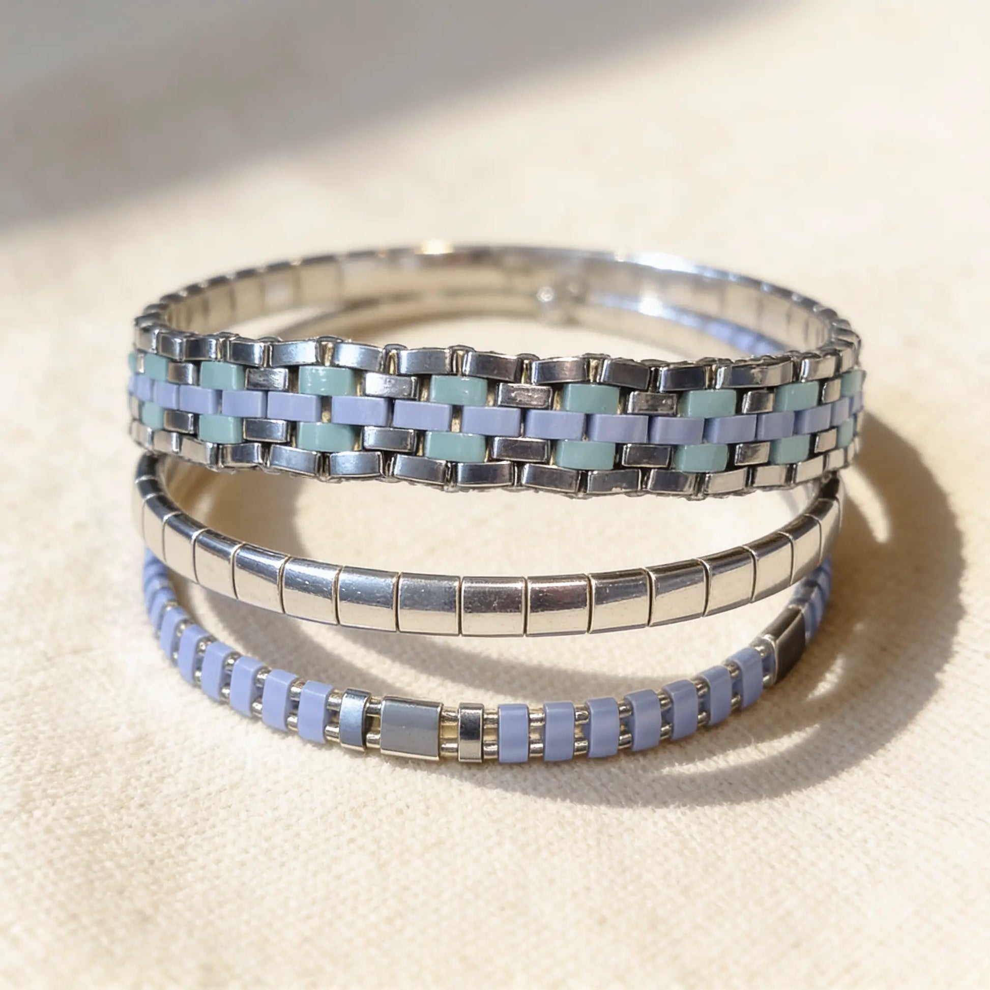 Handmade Azure Flow Miyuki Tila bracelet by Gem N Glow, featuring intricate beadwork with vibrant blue beads.