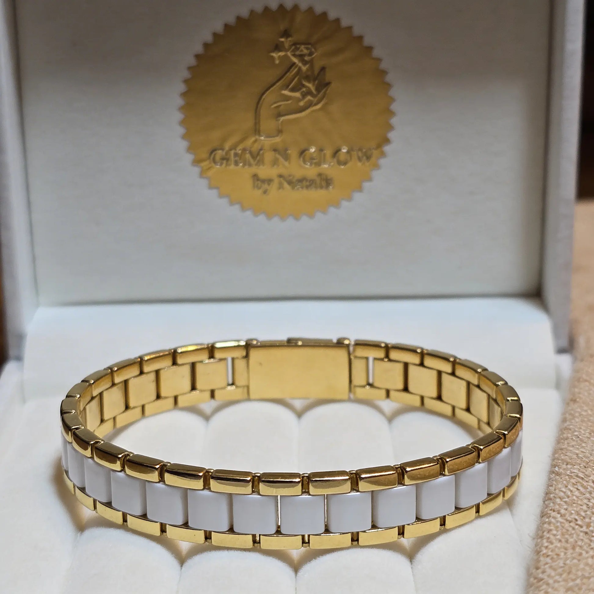 Ivory pulse bracelet by Gem N Glow by Natali featuring smooth beads and a delicate design for elegant wristwear.