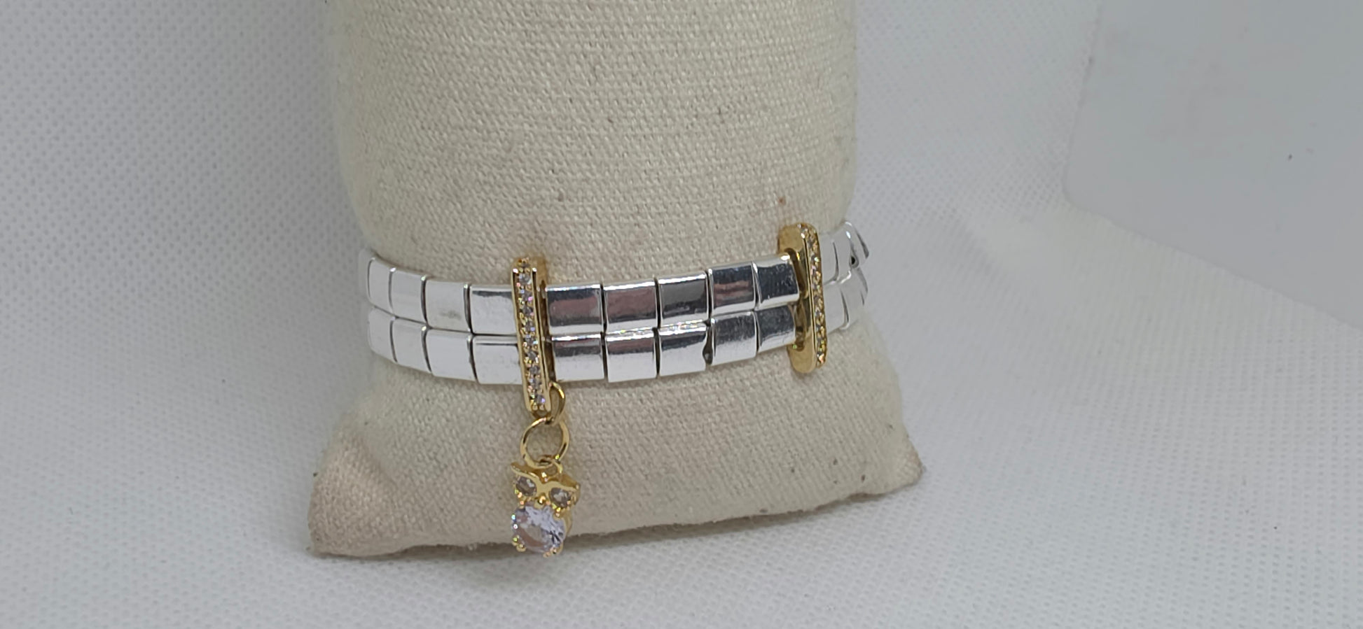 Handmade silver hematite bracelet with gold-plated zircon accents and crystal charm pendant.